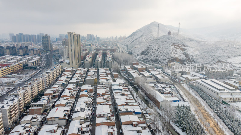 雪后城市楼房道路交通航拍