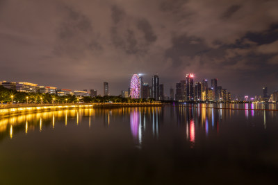 城市夜景湖畔摩天轮高楼景观