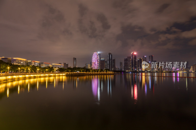 城市夜景湖畔摩天轮高楼景观