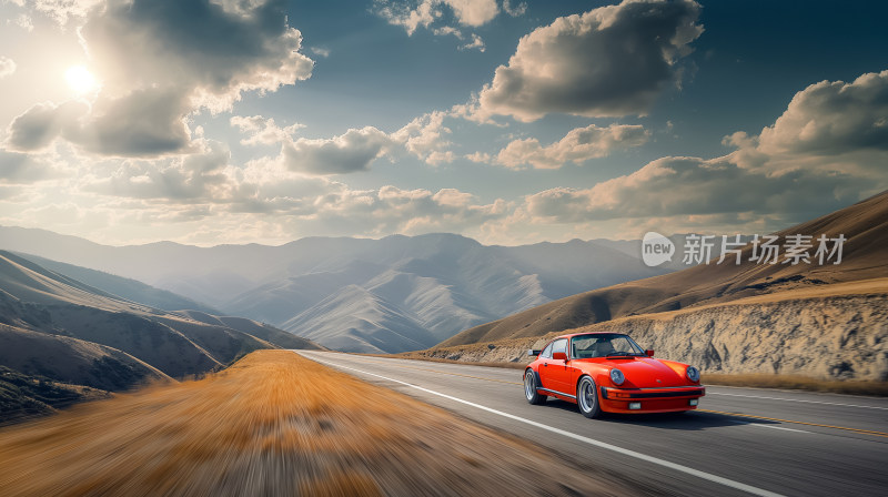 橙红色古典跑车在山路上驰骋：自由与速度