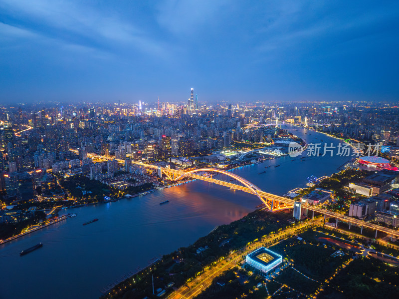 航拍上海城市夜景卢浦大桥世博园