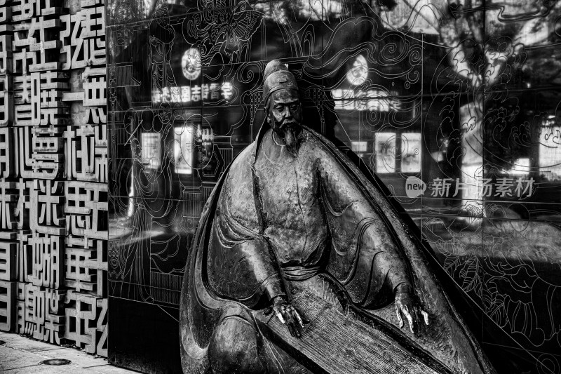 古代人物抚琴雕塑