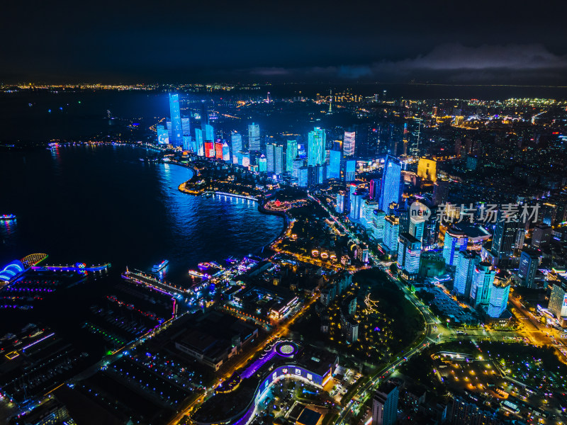 中国山东青岛城市夜景灯光秀航拍延时海边