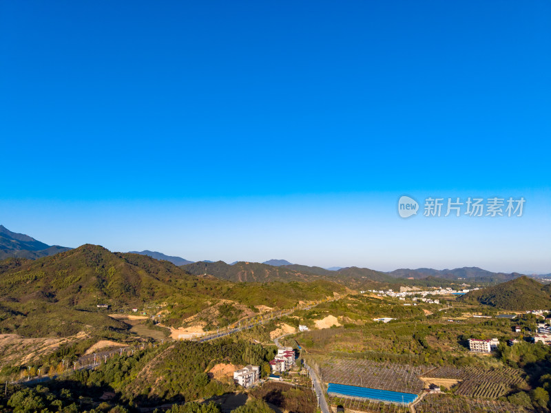 航拍大山乡村公路农田