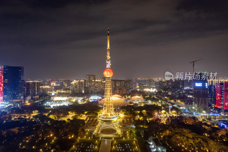 广东佛山电视塔地标建筑夜景航拍图