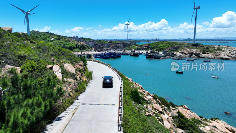 汽车行驶在海边公路航拍风景旅拍旅行自驾游