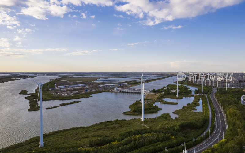 河堤河道旁风力发电机组城市风光自然风景