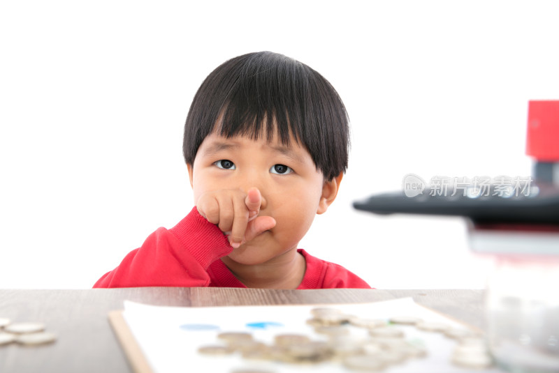 摞好的计算器和小房子模型