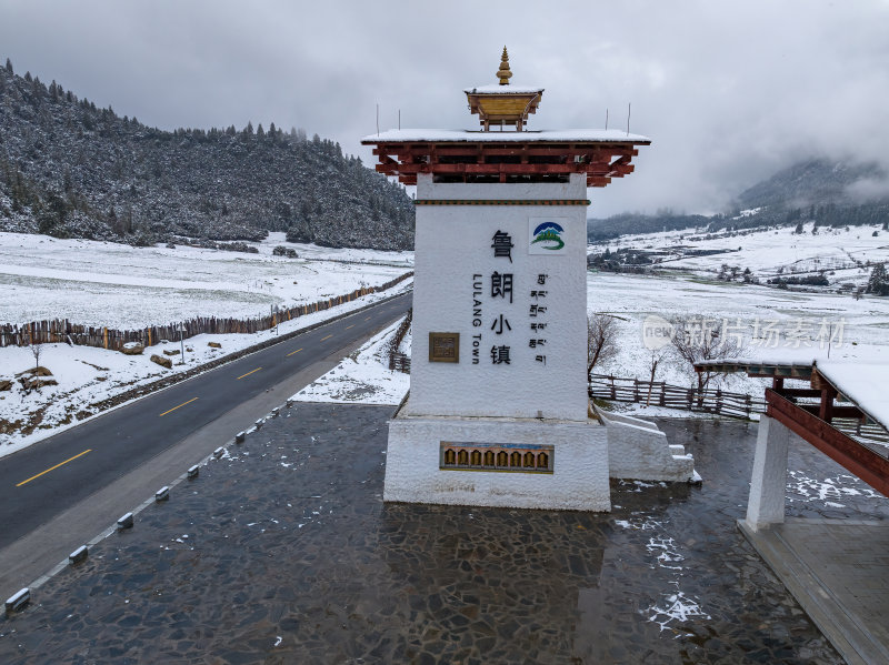 西藏林芝地区鲁朗小镇雪景高空航拍