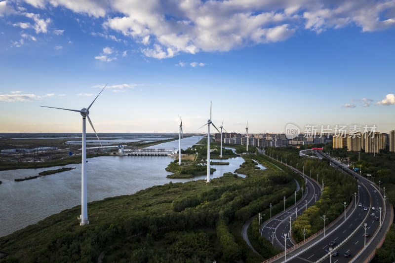 河堤河道旁风力发电机组城市风光自然风景