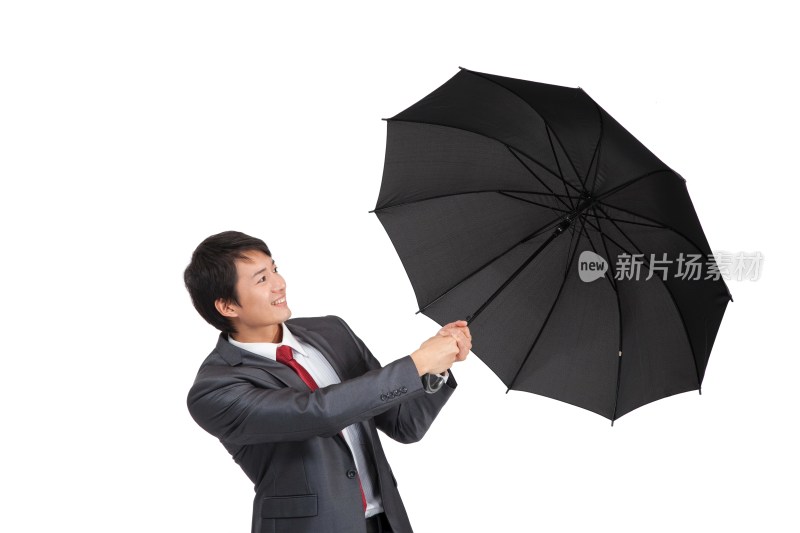 棚拍商务装年轻男人撑雨伞