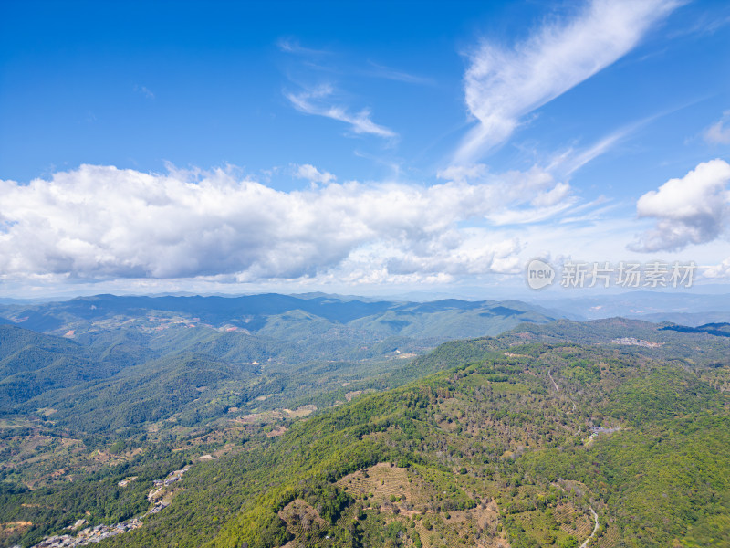 航拍蓝天白云下的景迈山山脉自然风光