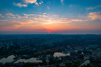 江苏宿迁城市日落晚霞夕阳航拍摄影图