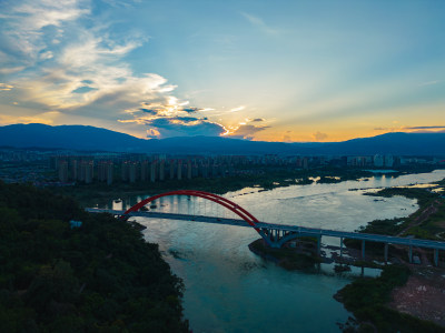 航拍日落时西双版纳景洪市城市风光