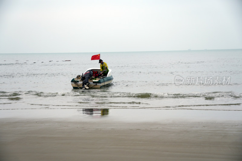 海南三亚海滩渔民沙滩自然风景