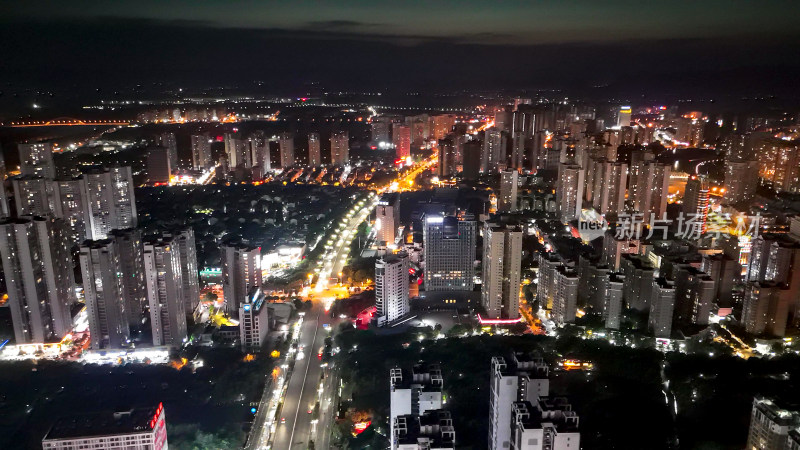 广西来宾城市高楼建筑夜景灯光航拍图