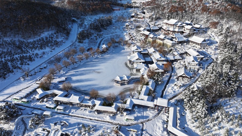 航拍威海市环翠区华夏景区冬季雪景