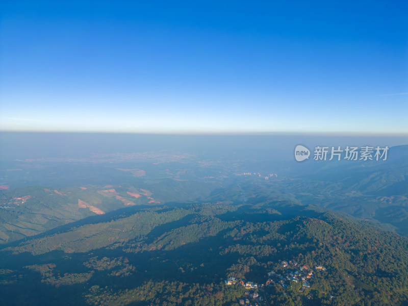 高空航拍蓝天下的山脉自然风光