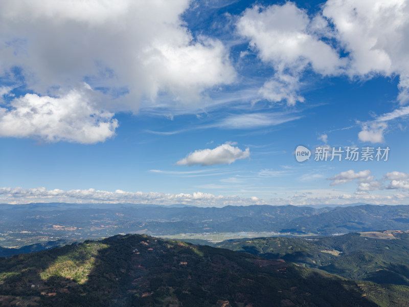 航拍蓝天白云下的景迈山山脉自然风光